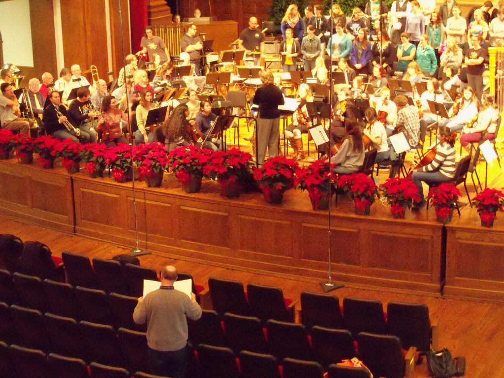Composer Jesse Ayers at rehearsal for premiere Milligan College Orchestra-Chorus Christmas Commission