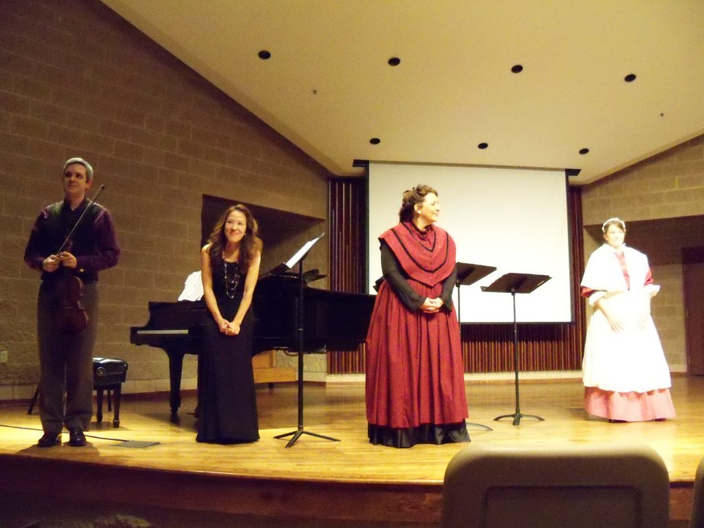 Photo of Soprani Comgani's premiere of composer Jesse Ayers' "Beneath Suspicion"