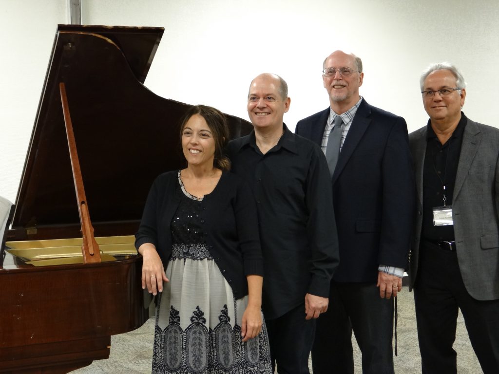 Composer Jesse Ayers with pianists Raquel Teare and Brent Schloneger at the premiere of "Shinkansen"
