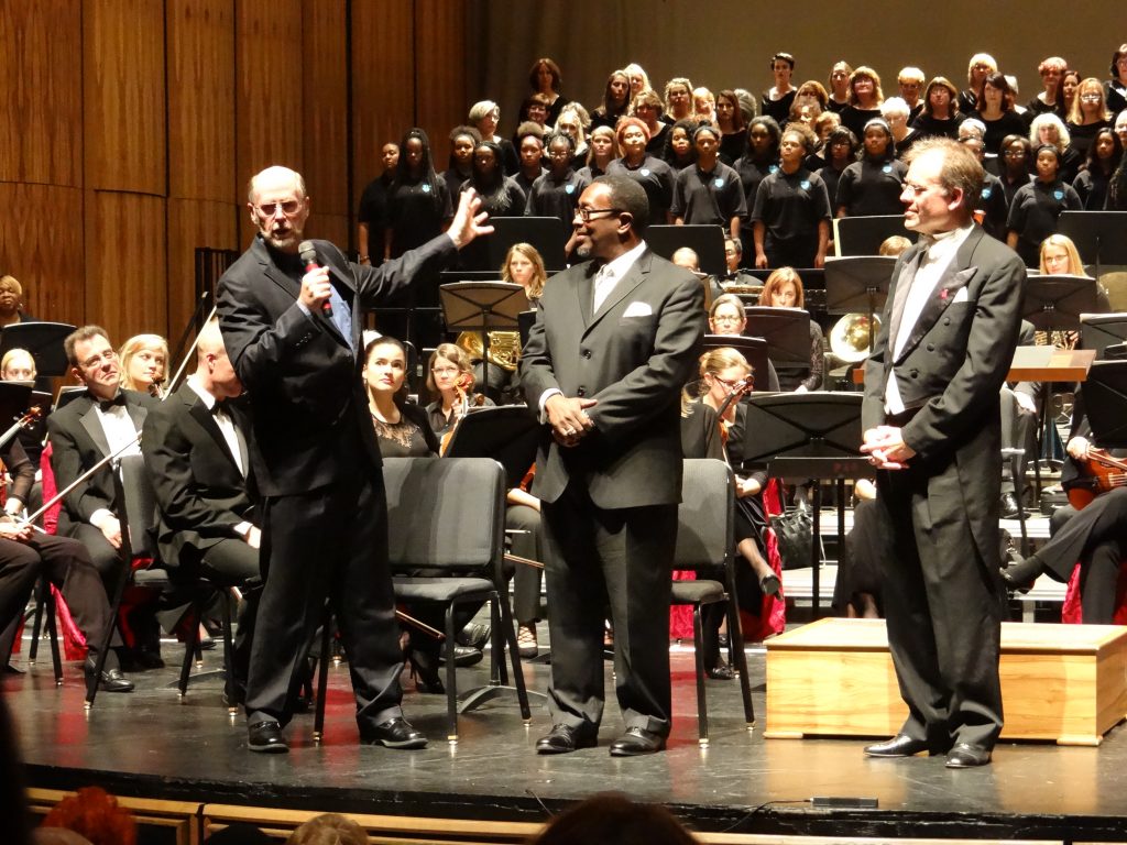 Composer Jesse Ayers adresses audience at premiere of Akron Symphony commission