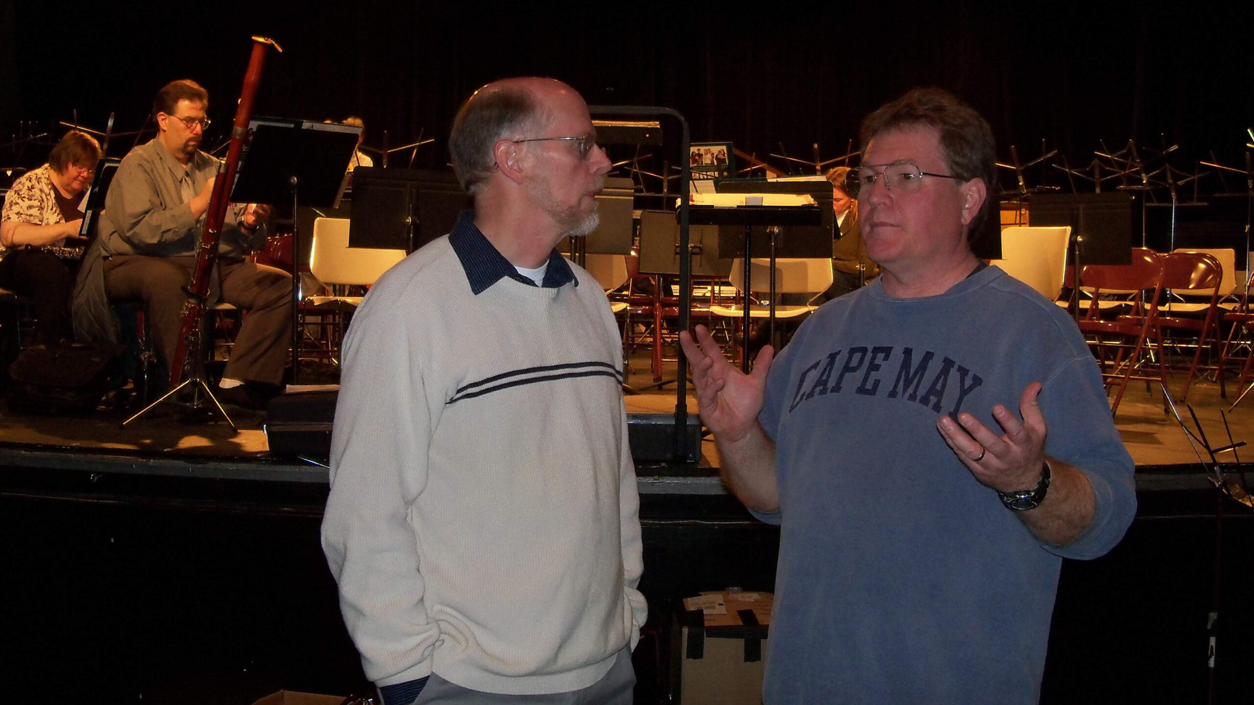 Rehearsal photo of composer Jesse Ayers and conductor Jeffrey Scott Doebler and the Windiana Concert Band, preparing for the Ayers Biblical Epics Trilogy concert
