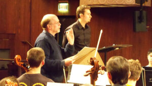 Jesse Ayers with conductor Dr. Travis Jürgens and the Ohio Northern University Symphony Orchestra